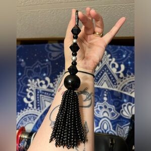 Jo Malone tassel clip bag charm. 10 inch long Black and pearl beads.